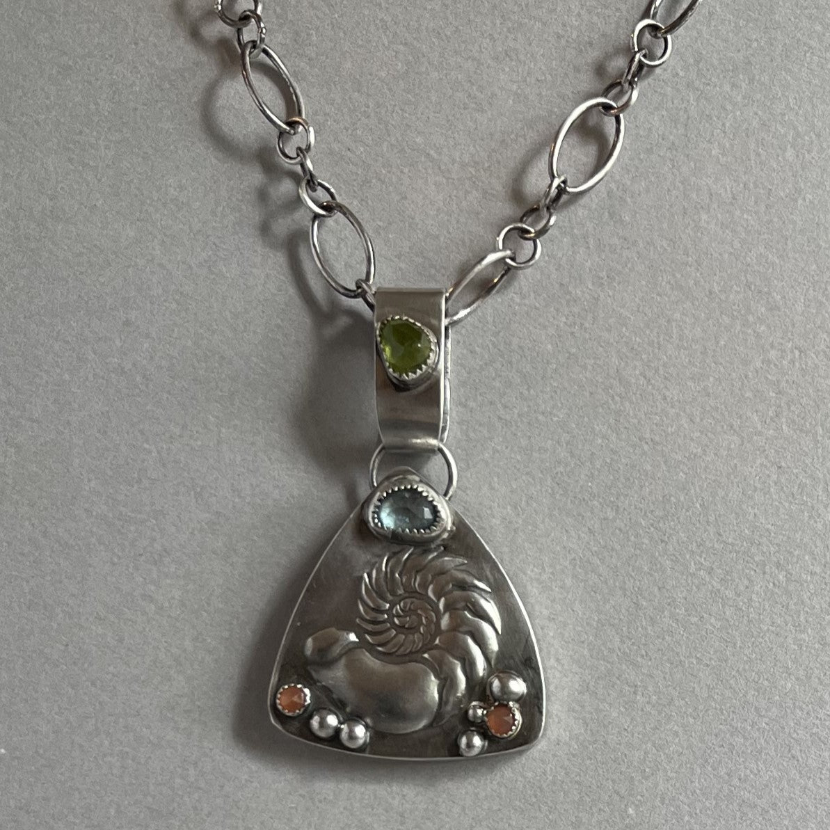 Hammered Shell with Peridot & Aquamarine